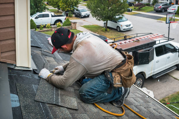 Professional Roofing technician working in Keezletown, VA